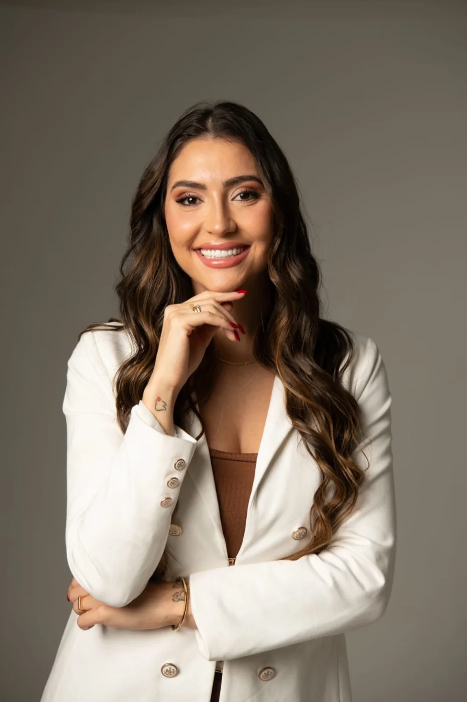 Dra. Ana Dias de blazer branco